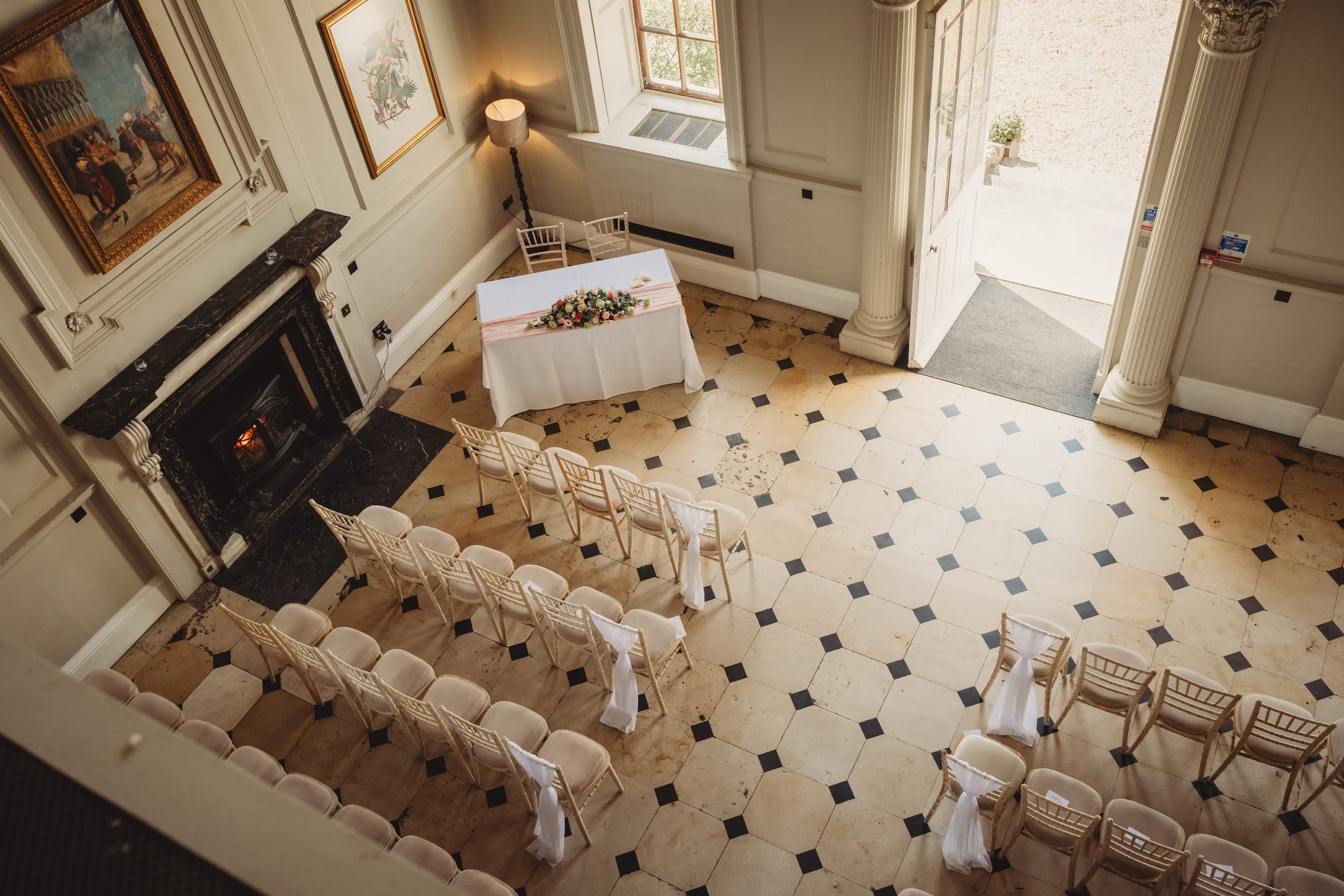 Ceremony room dressed and waiting, fireplace lit
